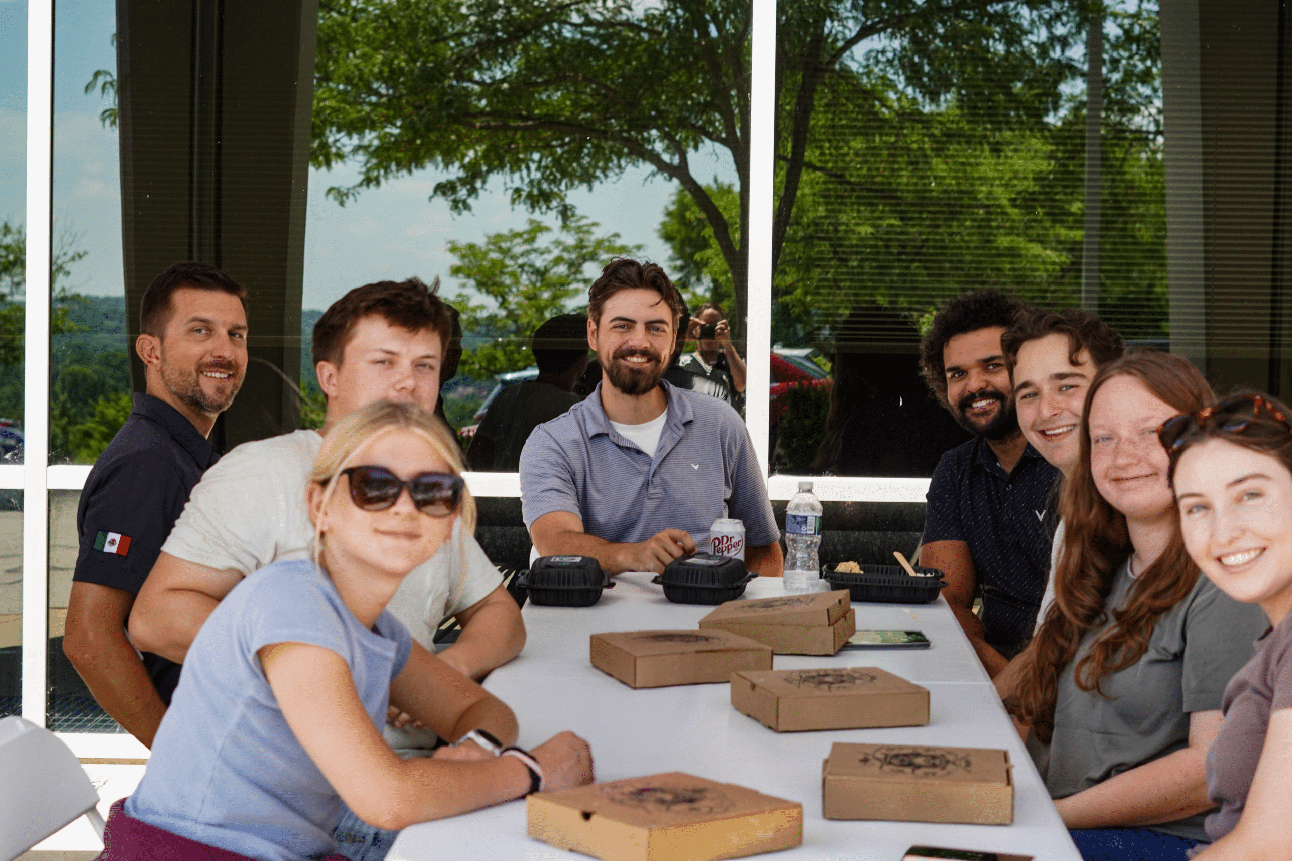 NE employees at company event.