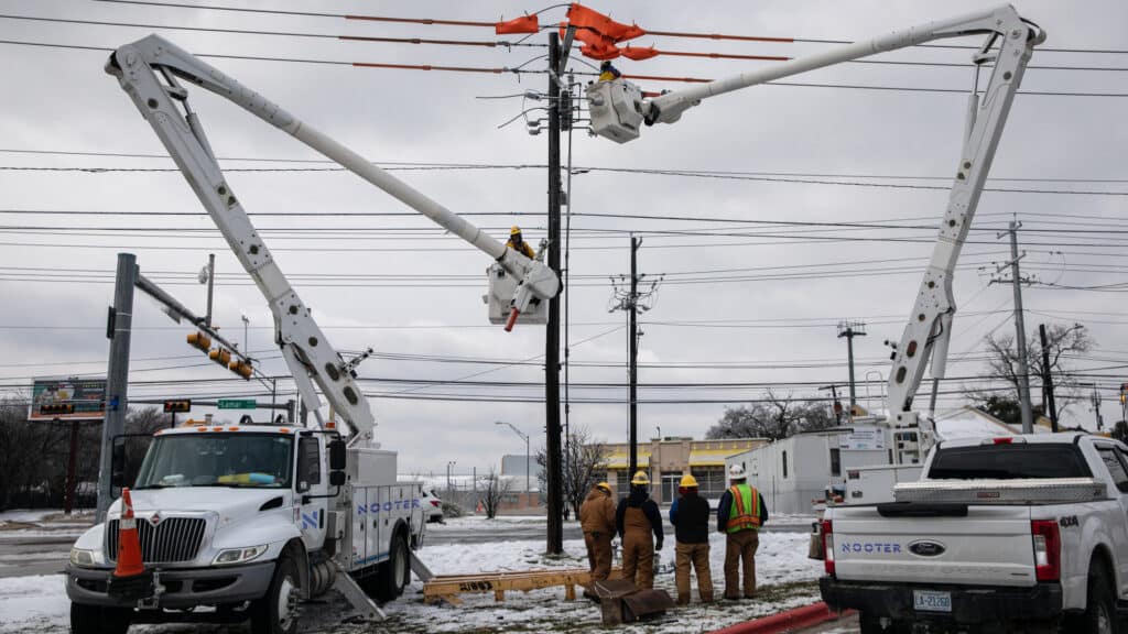 fixing power lines after a storm