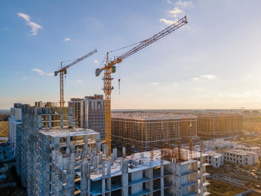 Cranes hovering a construction site